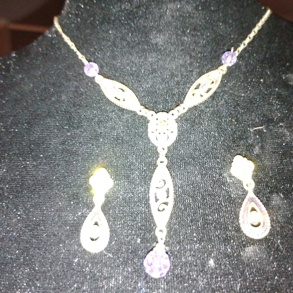 Nordstrom Gold and Purple Necklace with Intricate Design